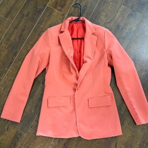 An orange blazer and cute white jacket to wear over dress or tank.